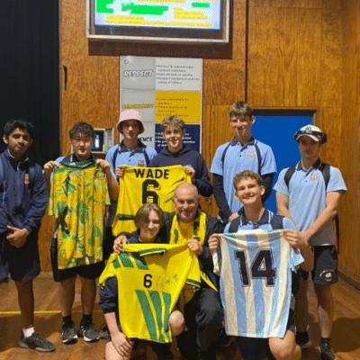 Paul Wade With Students From Muswellbrook High School Holding Jerseys